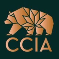 Image shows a logo of a bear composed of geometric shapes in a gold color, with the letters "CCIA" beneath it in matching gold on a dark green background, representing the Conference's emblem. CA Norml