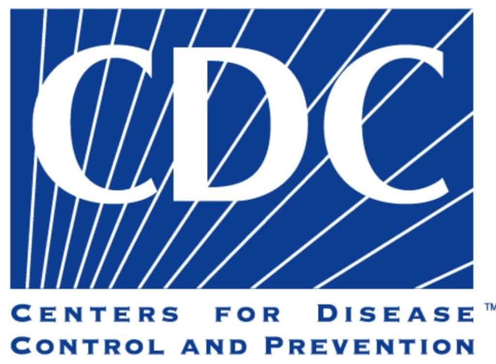 The image shows the logo of the Centers for Disease Control and Prevention (CDC), featuring the large letters "CDC" above blue diagonal lines. The full name "Centers for Disease Control and Prevention" is displayed below in blue uppercase letters, reflecting their adherence to CDC Guidelines. CA Norml