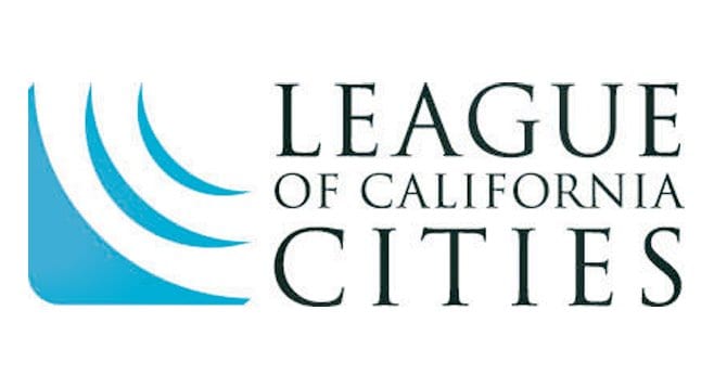 Logo design of the League of California Cities. The abstract, curved blue shape on the left resembles waves or a stylized letter "L" in a box. Prop. 64 initiatives like Cannabis Commerce are pivotal to their mission. The organization's name is written in uppercase serif font to the right of the graphic element. CA Norml