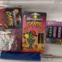 Image of four colorful cart packaging boxes labeled "West Coast Carts" featuring cartoon characters, and a metal cartridge attached to a blue pen-like battery. A small card listing features like "Lab Tested" and "96% THC" is also visible. CA Norml