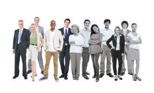 A diverse group of 13 customers stands in a row against a white background. They vary in attire, with some dressed in business wear and others in casual clothing. Their expressions are mostly neutral or smiling, representing different ages and genders. CA Norml