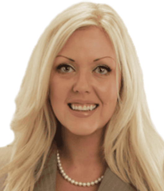 A smiling woman with long, platinum blond hair wearing a light gray blazer and a pearl necklace. She has light-colored eyes and is looking directly at the camera against a plain white background, ready to present at the 2024 Legal Seminar for Cal NORML. CA Norml