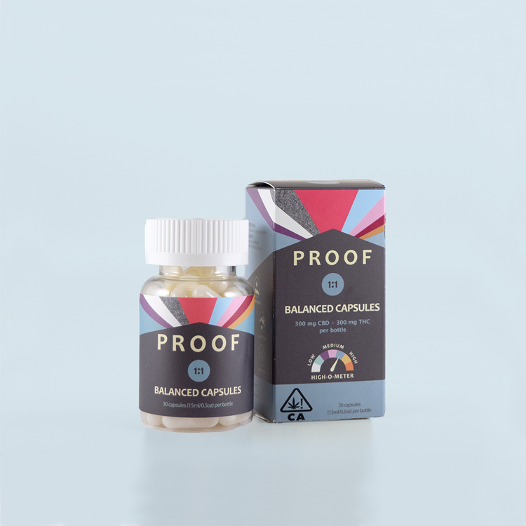 A bottle and box of Proof Balanced Capsules are displayed on a light blue background. The packaging is dark with a colorful geometric design and indicates CBD and THC content. CA Norml