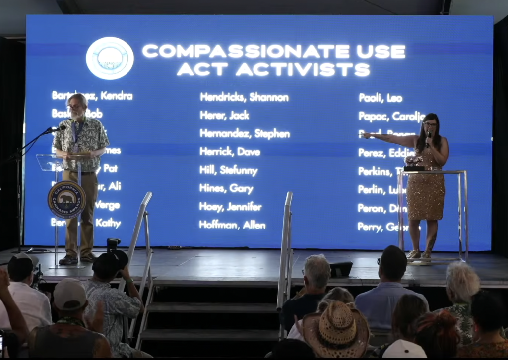 Cal NORML director Dale Gieringer being introduced by Rachelle Gordon of Greenstate at the CA State Fair. 